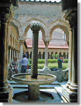 Fountain in corner has style of cloiter